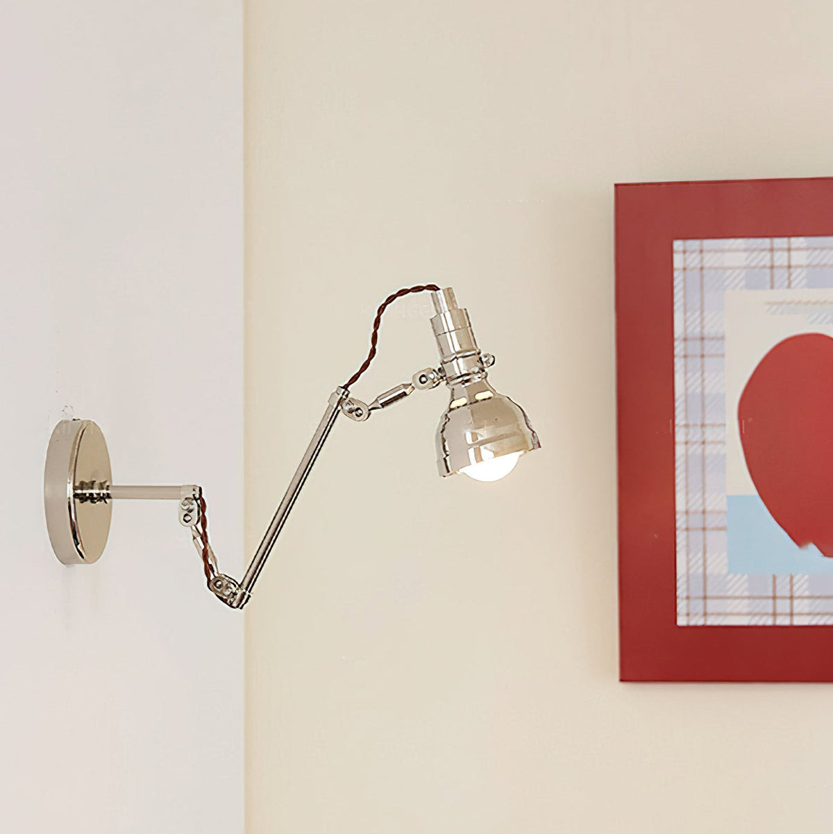 Side view of the industrial-style swing arm wall lamp.