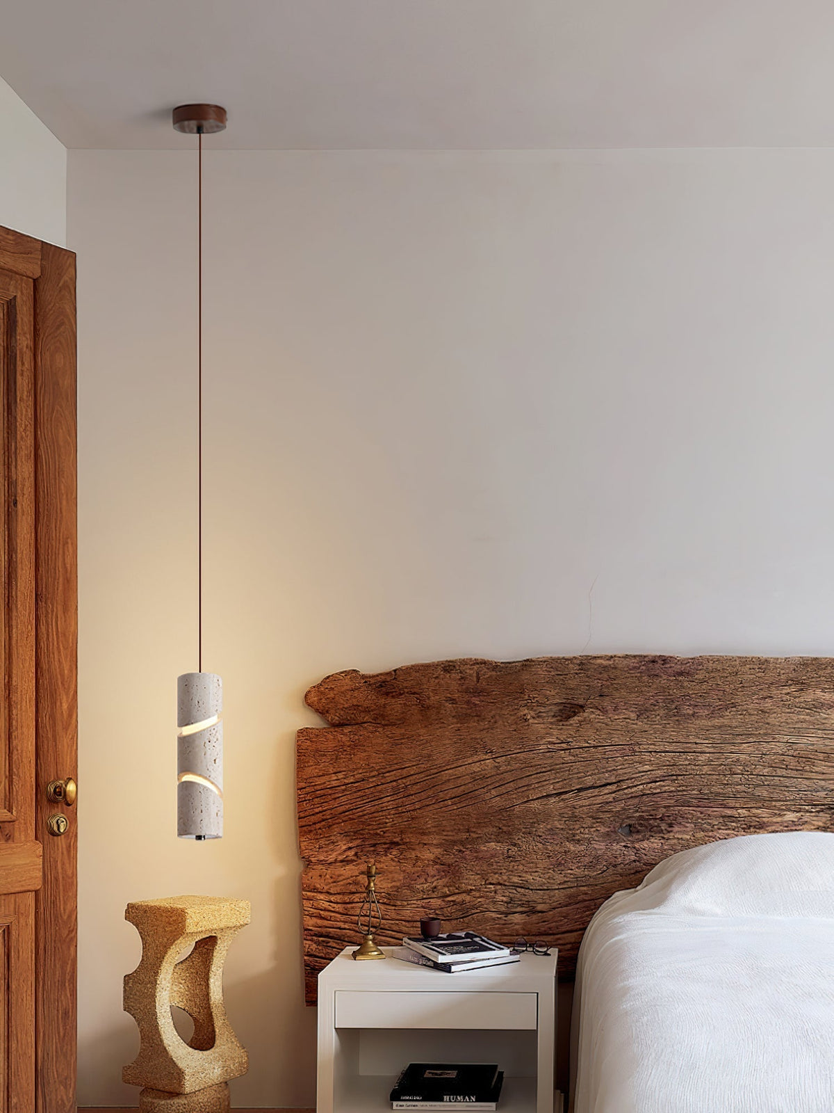 Awsinil Pendant Lamp viewed from a side angle against a neutral wall.