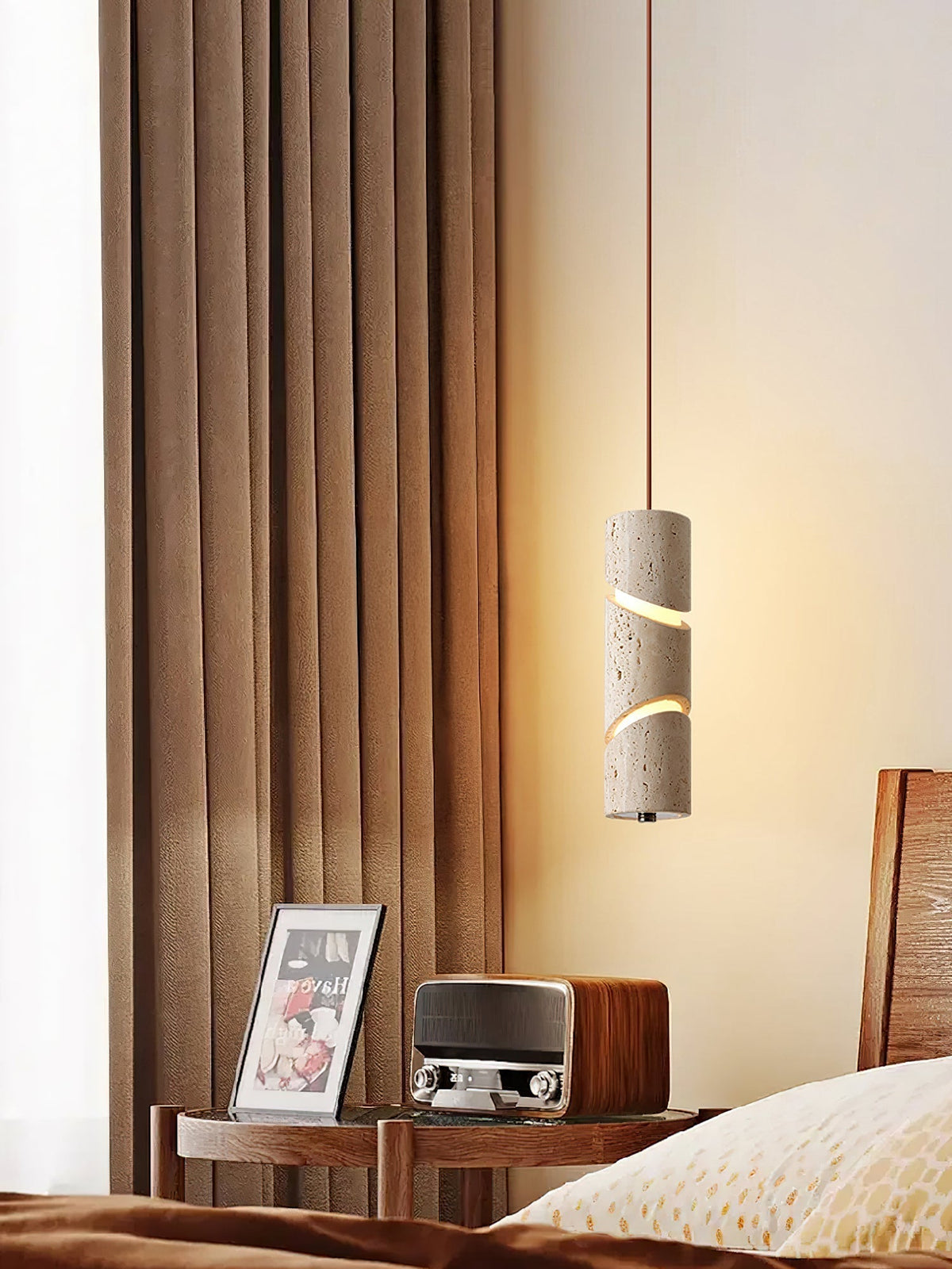 The cylindrical form of the Awsinil Pendant Lamp.
