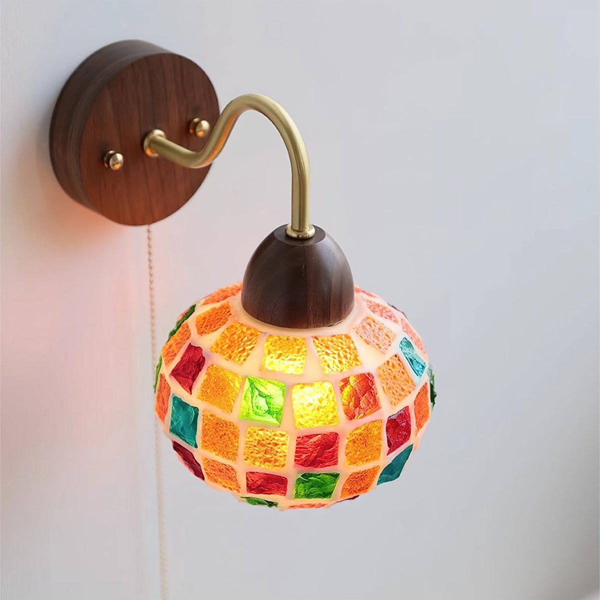Side view of the Balcony Wall Lamp highlighting its wood base and brass details.