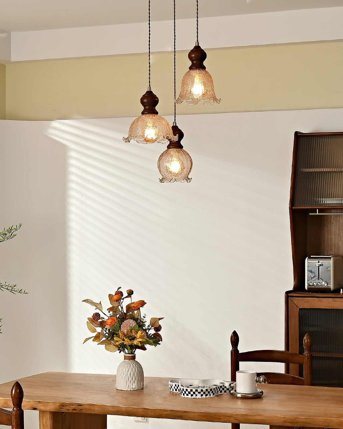 Barron Pendant Light hanging over a kitchen island.