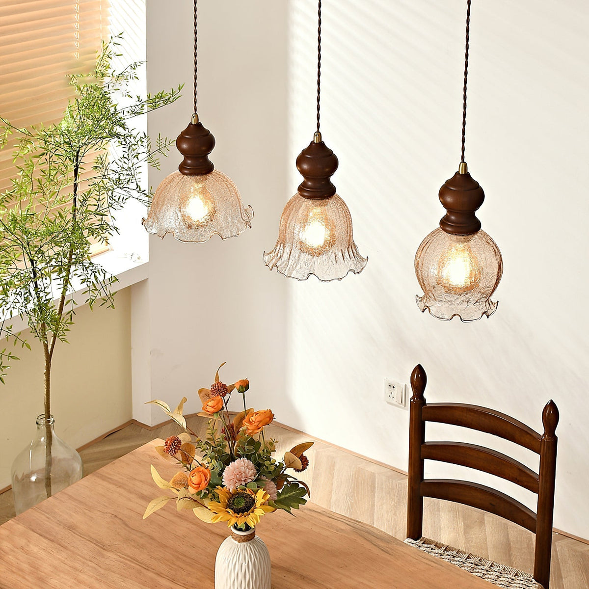Barron Pendant Light Model C with a squat, wide amber glass shade.