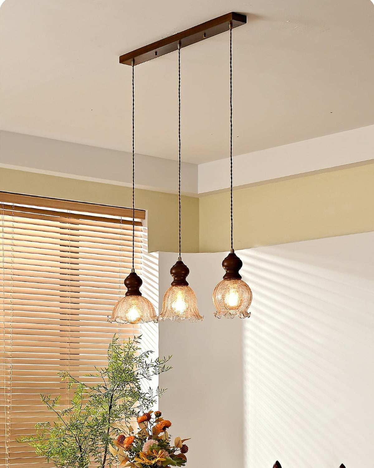 Detail shot of the light fixture's wooden component showing the grain.