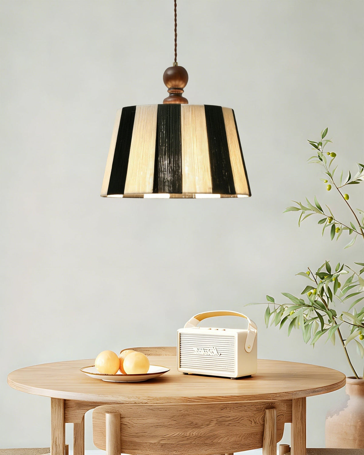 Angled shot of the Beatrice Pendant Light against a plain background.