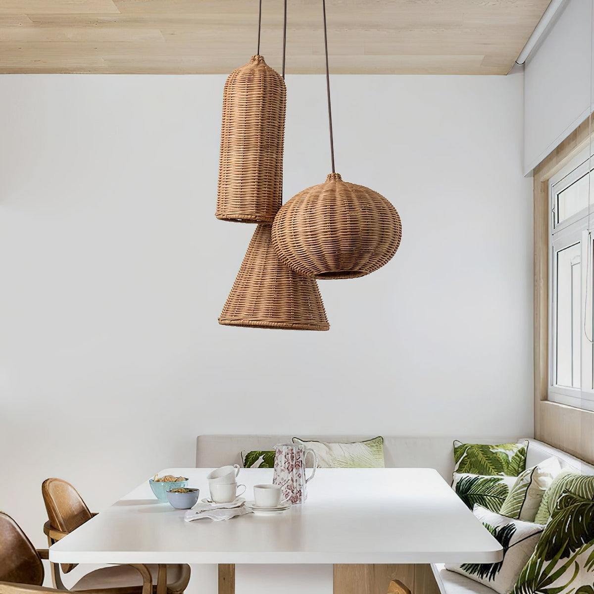 Model B of the Beliani pendant light with a tall, cylindrical rattan shade.