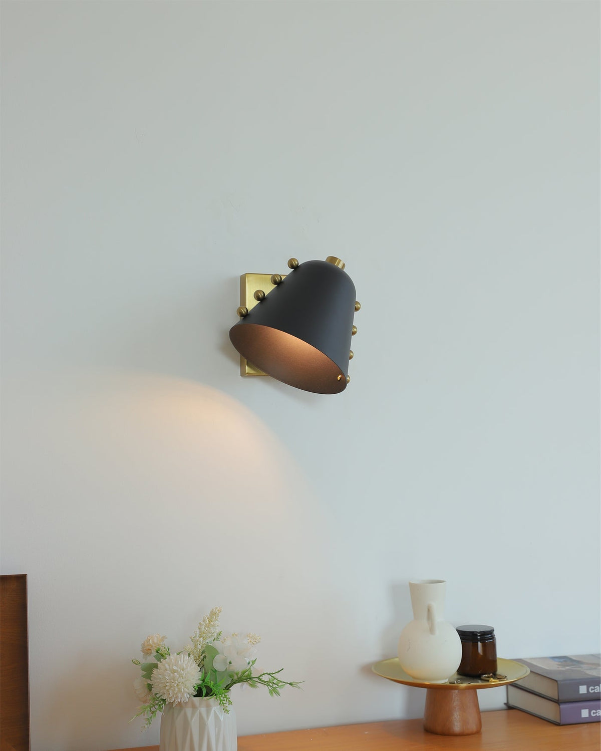 Close-up of the chrome finish on the Bespoke wall lamp.