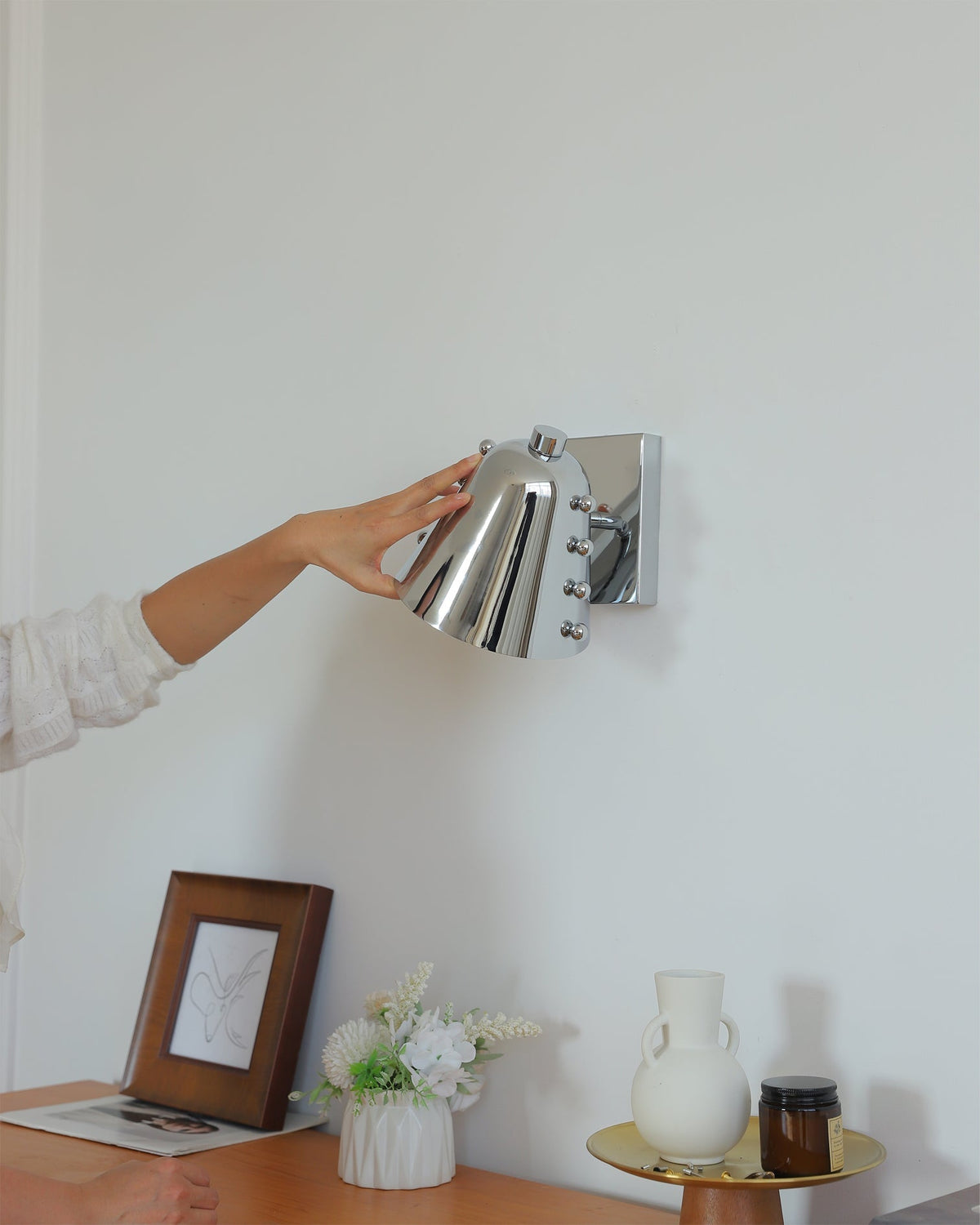 Bespoke wall lamp in a commercial setting like a hotel lobby.