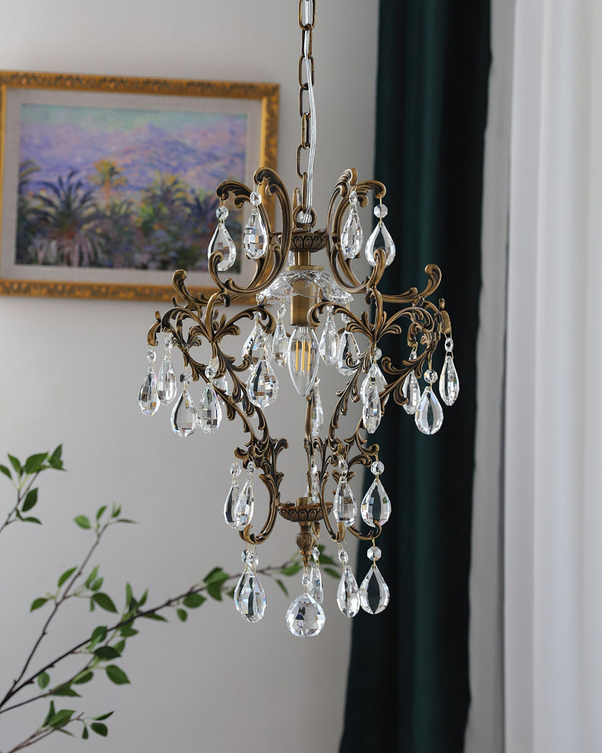 Brass pendant light shown unlit against a white background.
