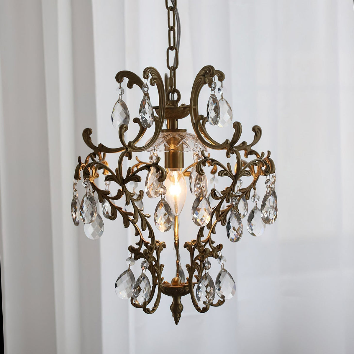Bronze pendant light shown unlit against a white background.