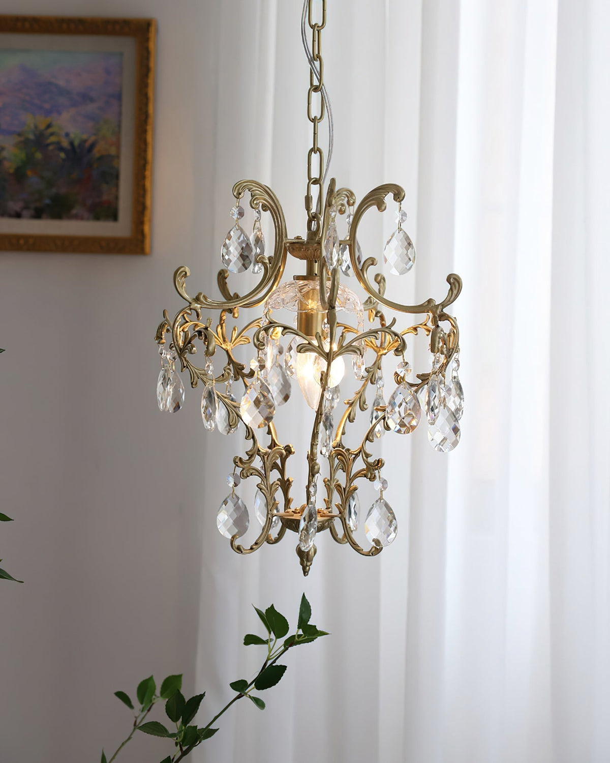 The birdcage pendant light illuminated, casting a warm glow.