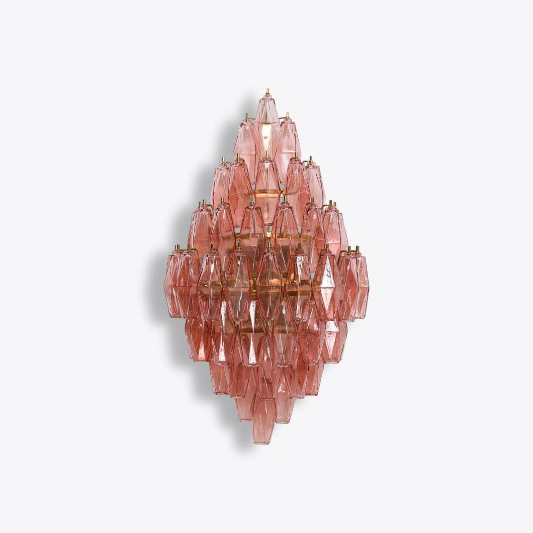 Biscayne sconce in gold finish, in a luxurious interior.