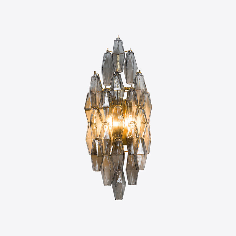 Biscayne Polyhedral Glass Sconce in an amber finish.
