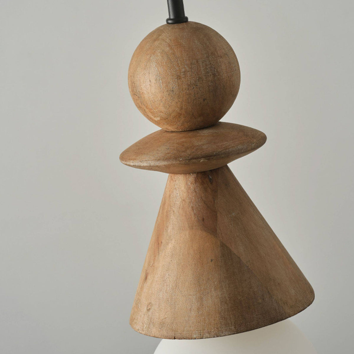 The Bodie pendant light in a minimalist reading nook.