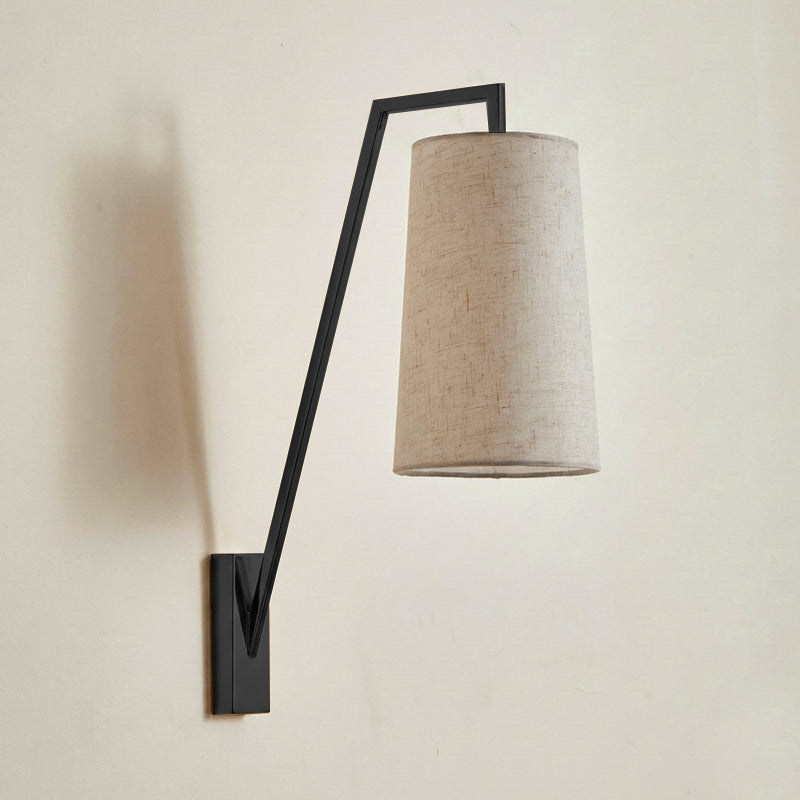 Bonny Wall Light in antique bronze finish, installed in a hallway.