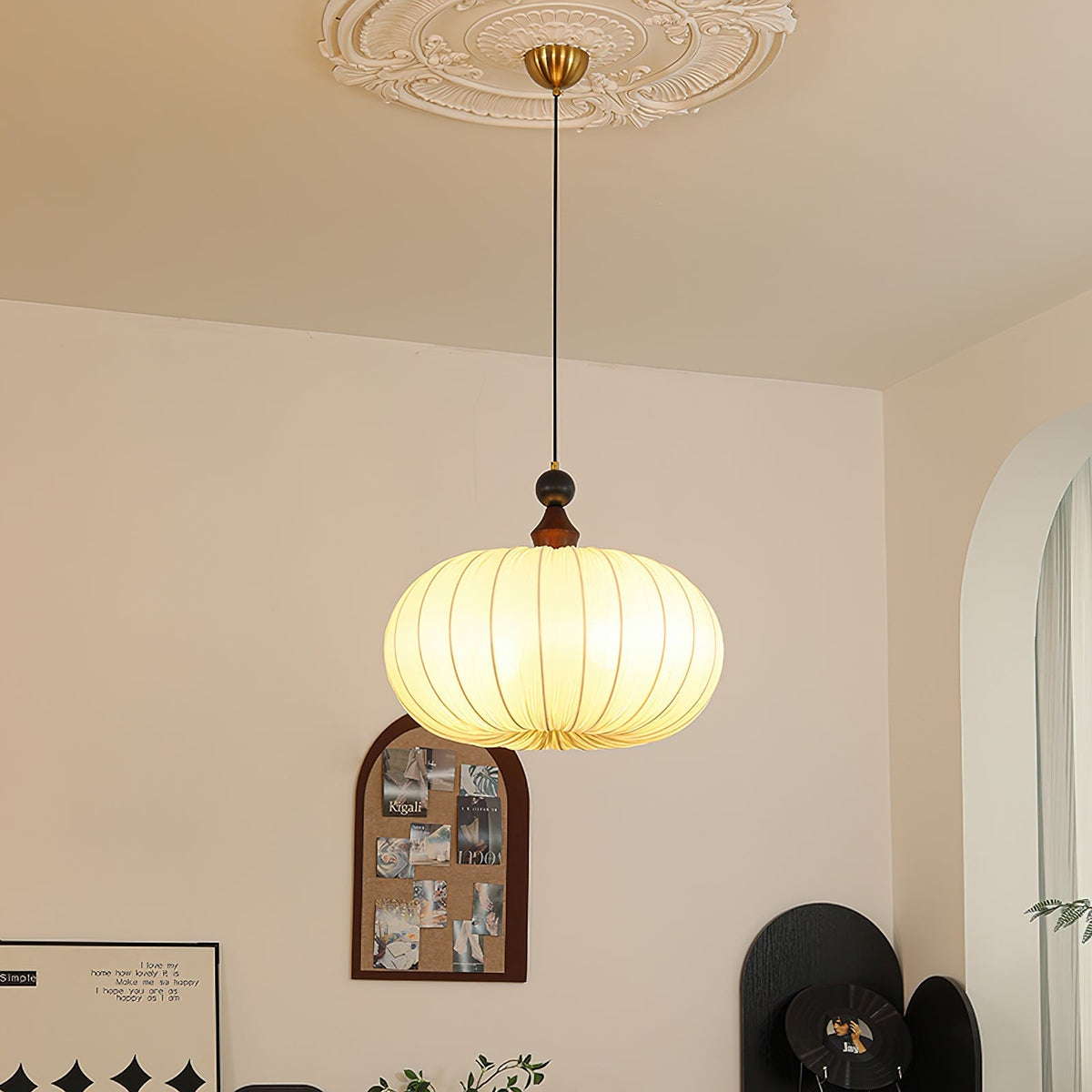 Side profile of the Bowie Pendant Light showcasing its lantern-inspired shape.