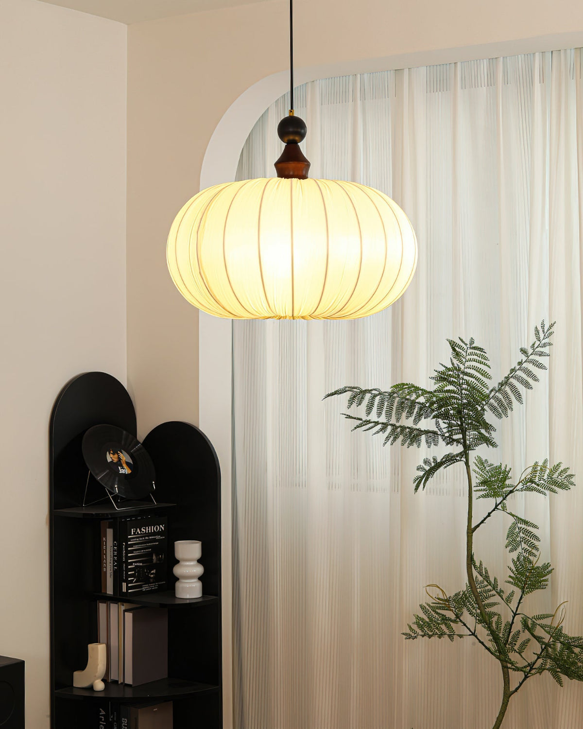 The Bowie Pendant Light in a walnut and white finish.