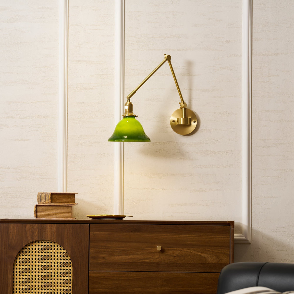 The texture and finish of the brass arm.