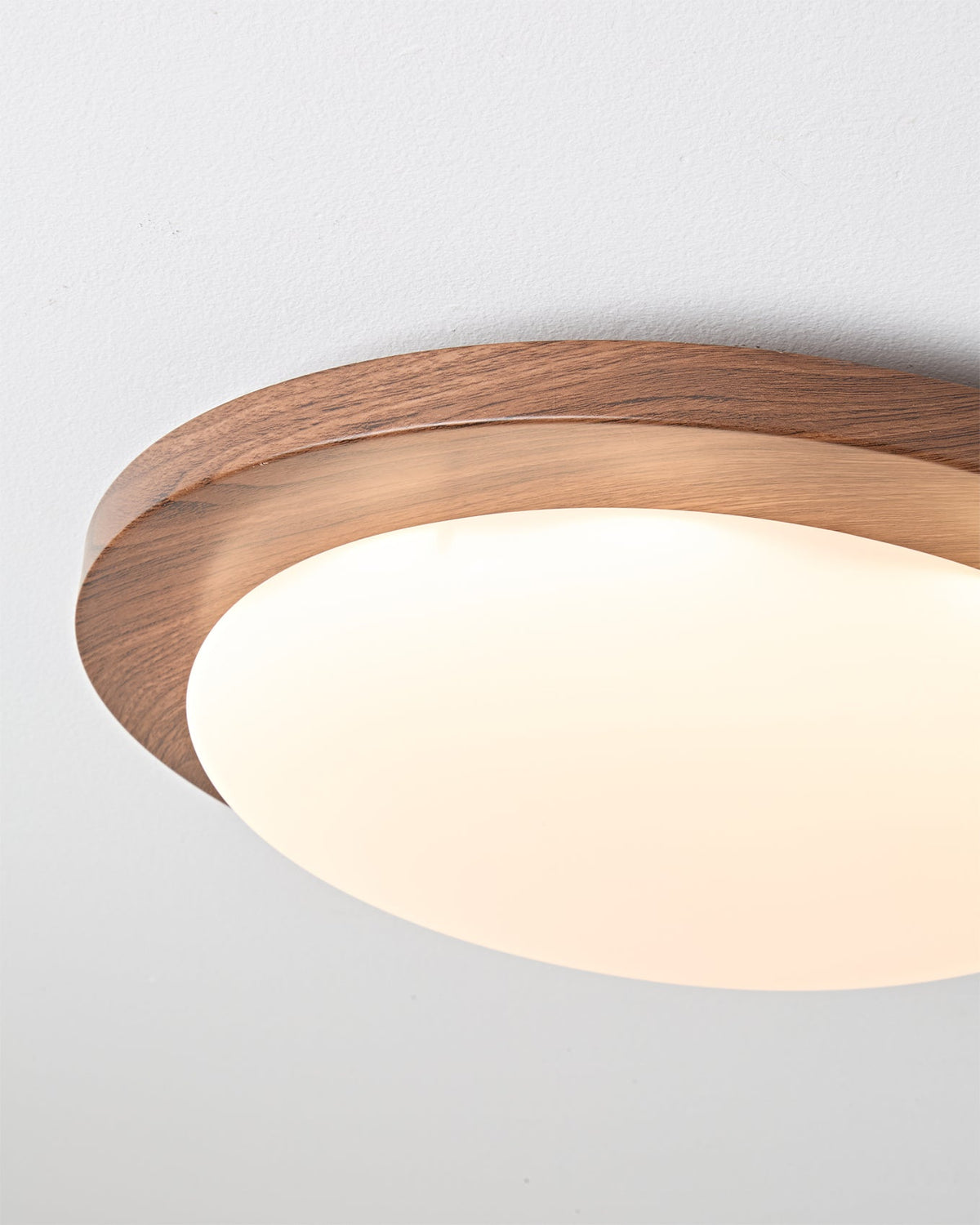 Lifestyle image featuring the Bromo Ceiling Light above a seating area.