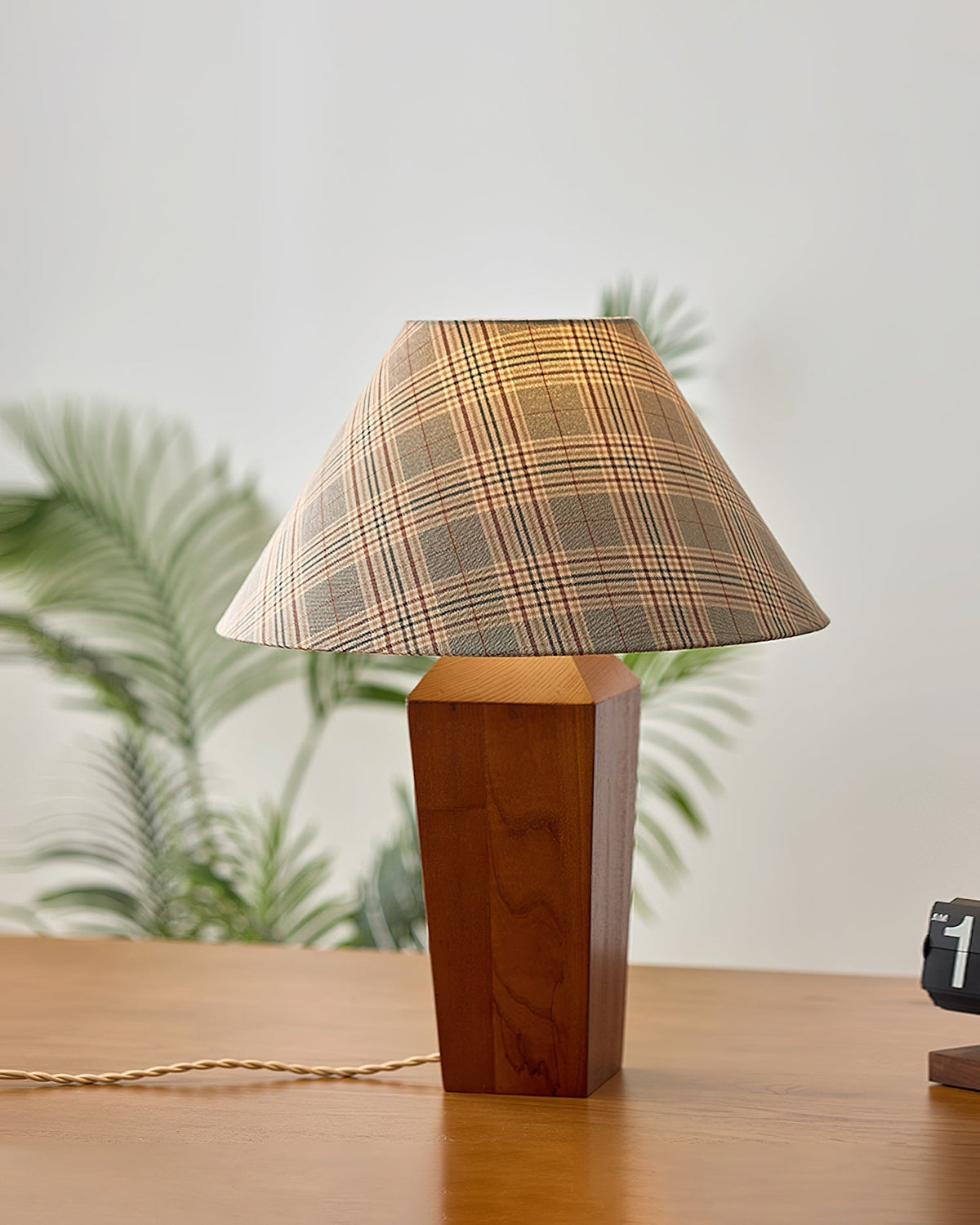 Angled view highlighting the texture of the wood and fabric.