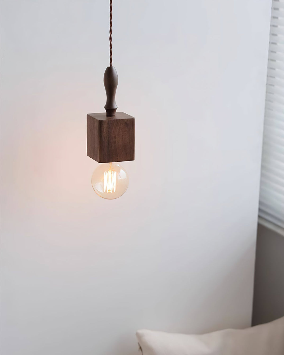 Side view of the Cano Pendant Light, model A, showing its geometric silhouette.