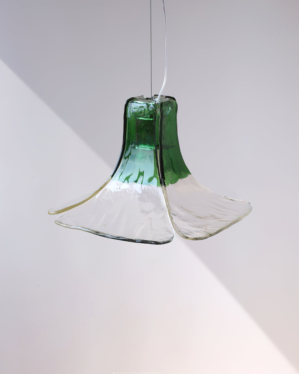 Lifestyle image showing the Carlo Pendant Light in an artistic interior.