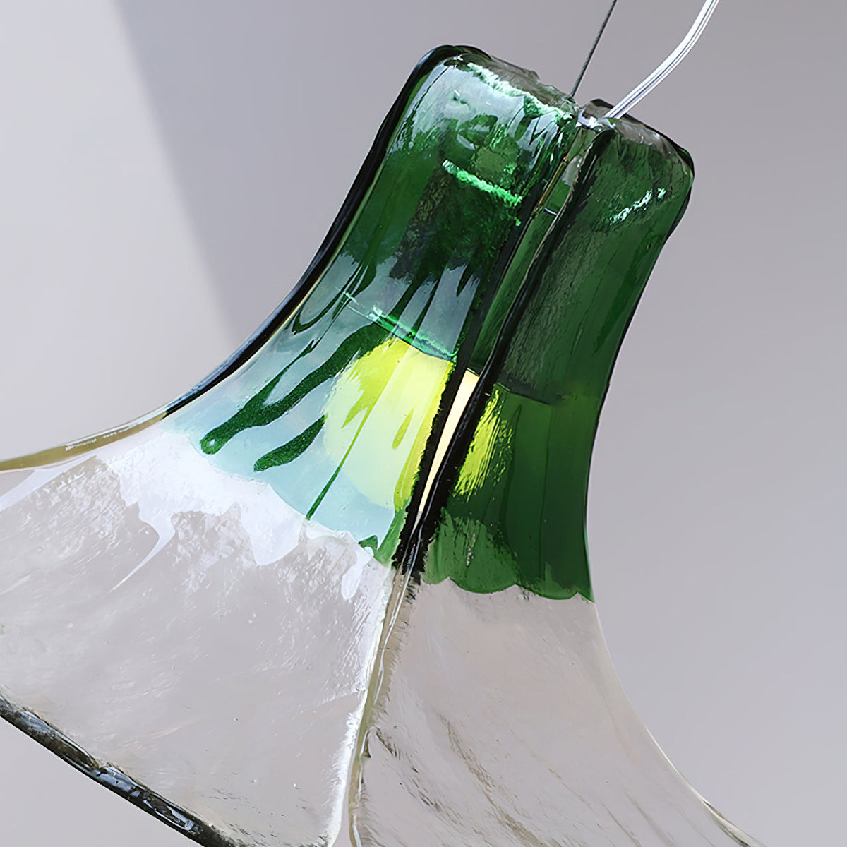 The Carlo Pendant Light illuminated, creating an interplay of light and shadow.