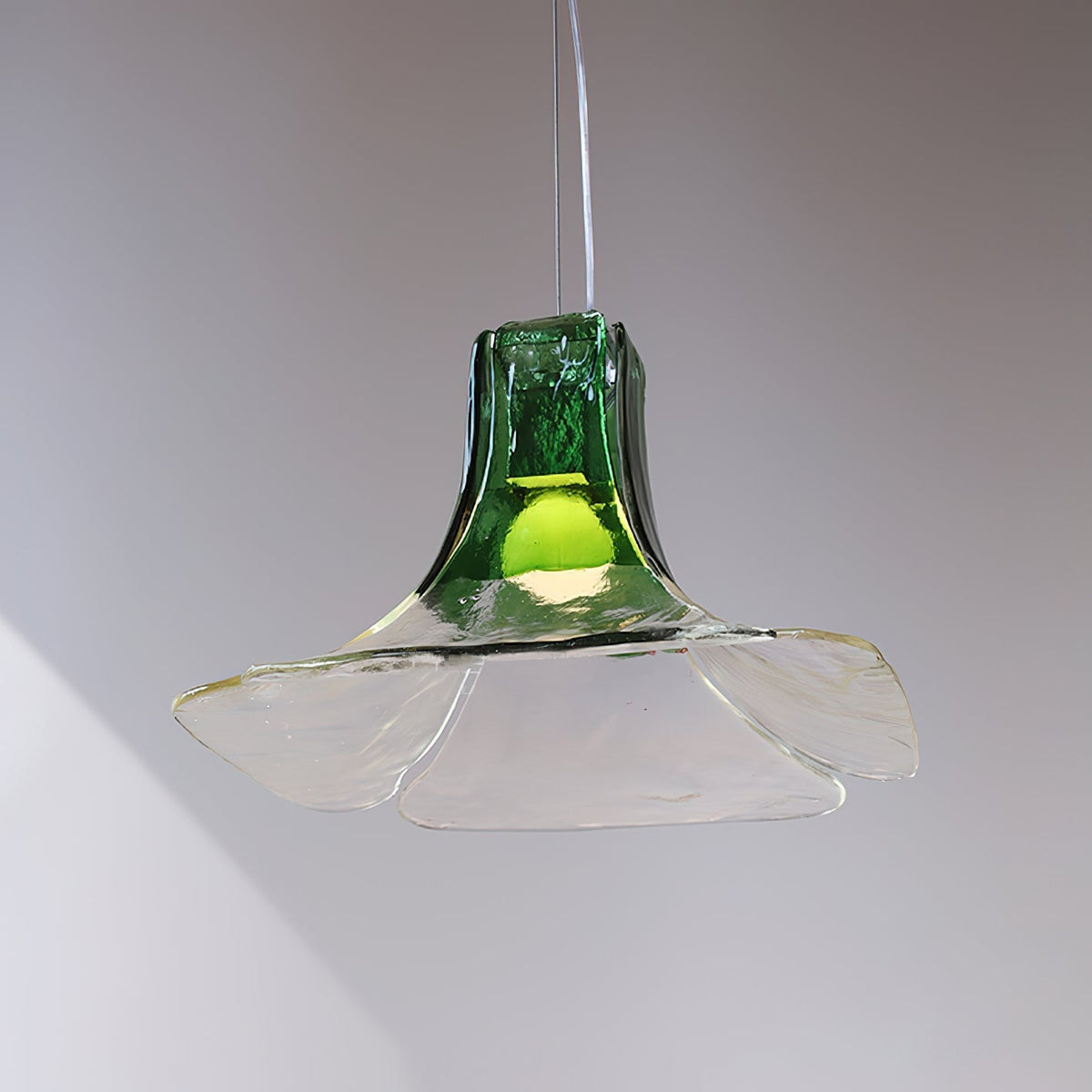 Side profile of the smoky gray and clear Carlo Pendant Light.