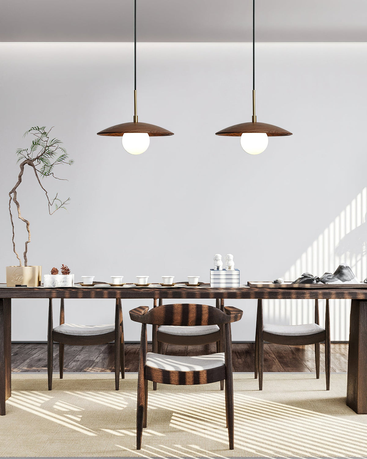 Angled view of the Caroll Pendant Light showing its sleek design.