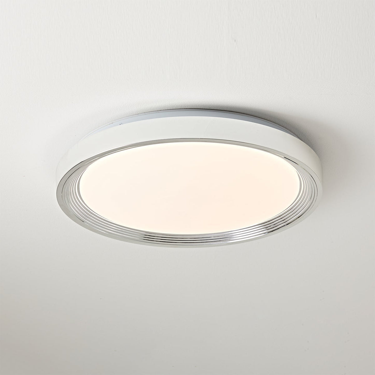 Cerova Ceiling Light in cream finish, turned on.