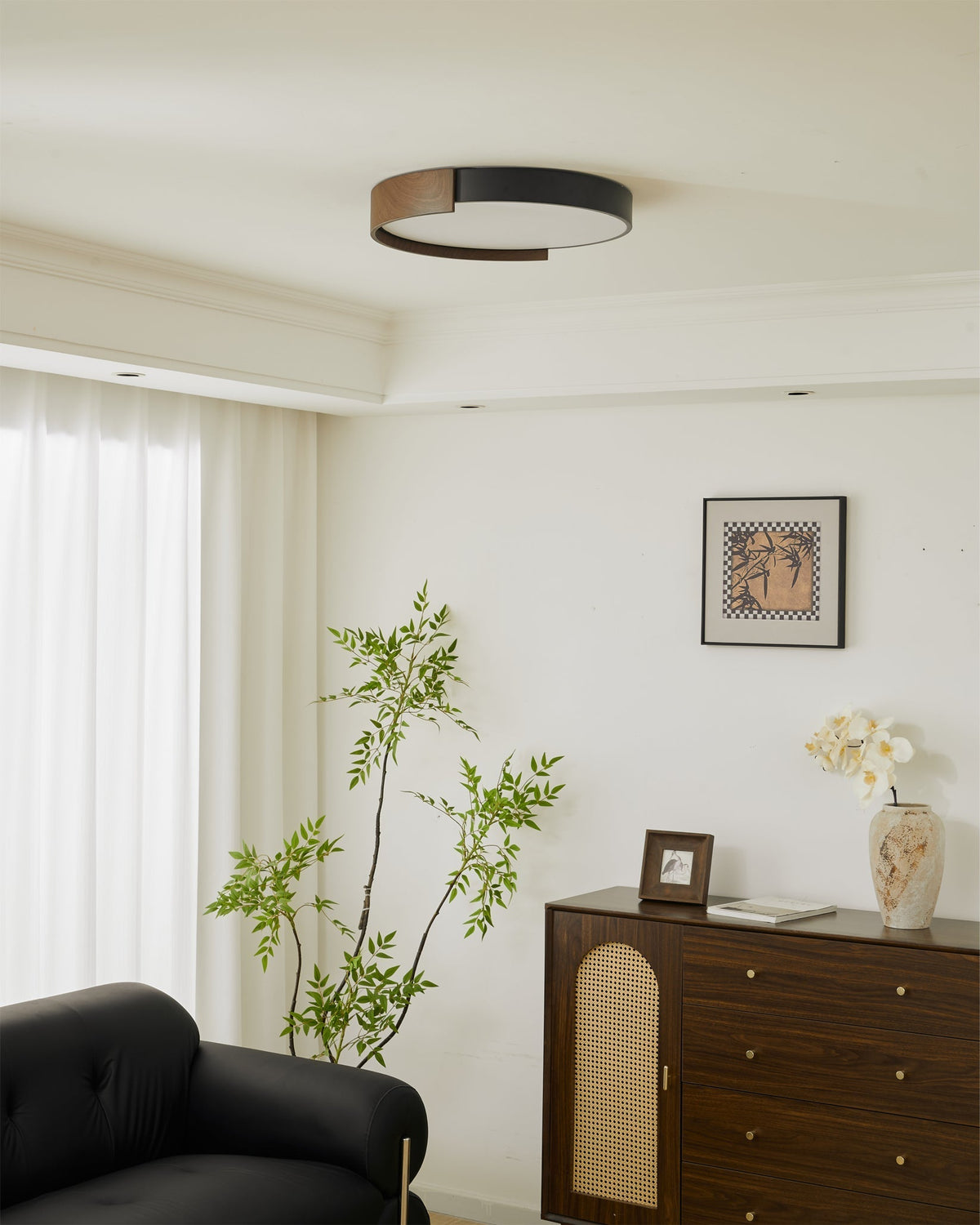 The ceiling light casting a warm glow.