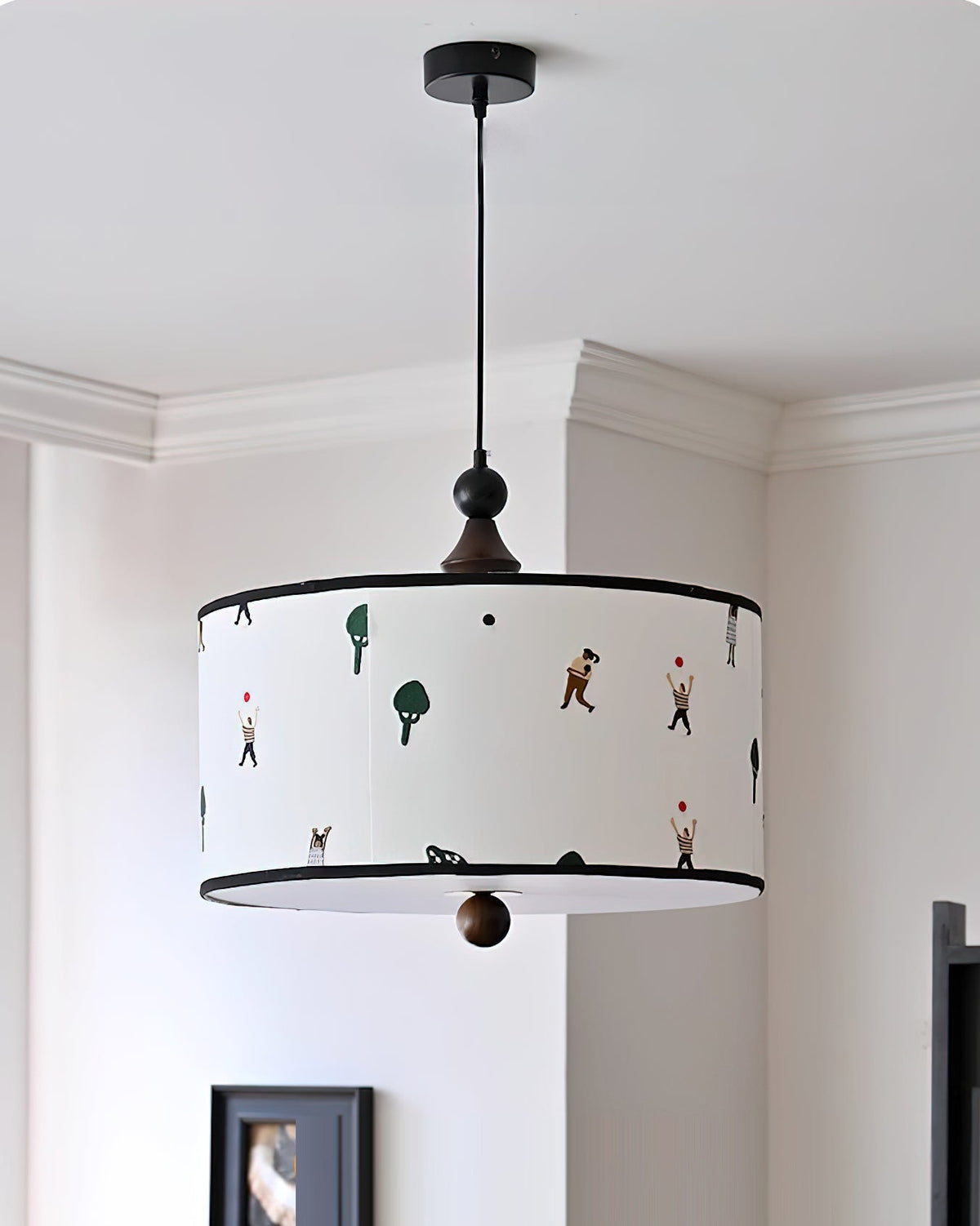 Congo Pendant Light shown hanging in a child's bedroom setting.