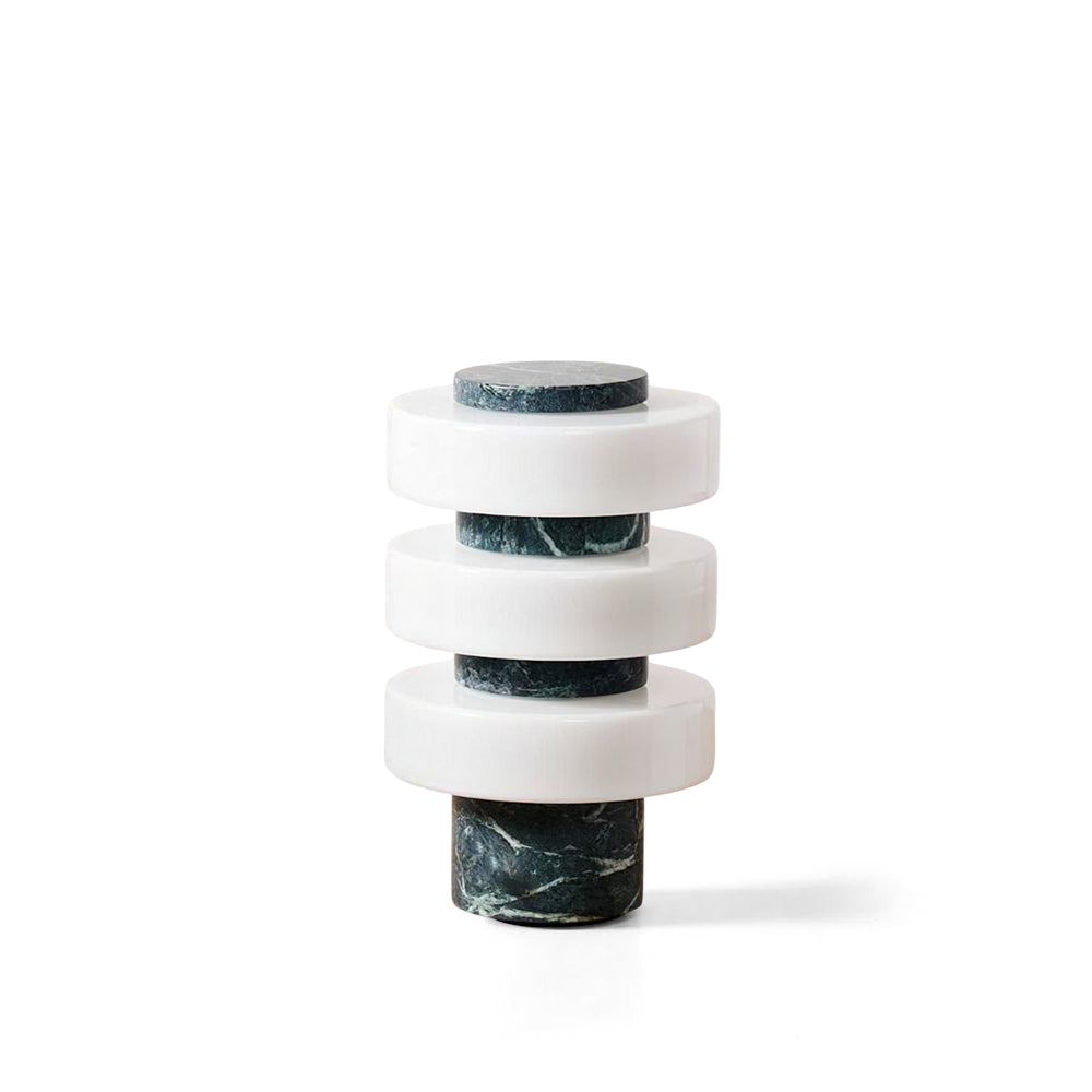 Full view of the Corba Table Lamp in a minimalist setting.