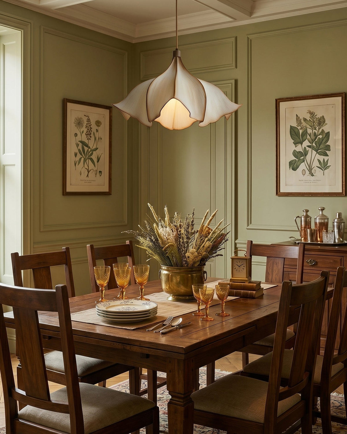 The Viscontea Pendant Light illuminated, casting a soft, diffused glow.