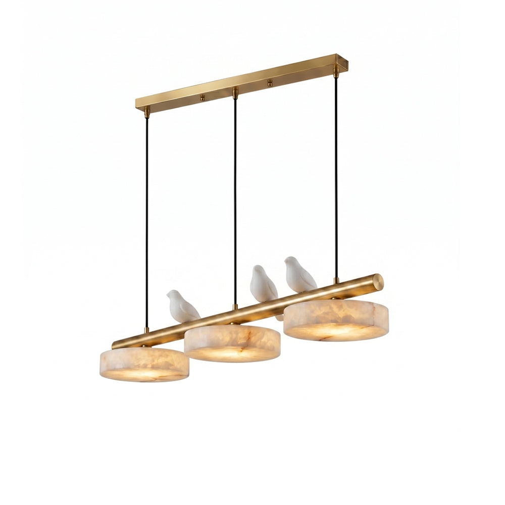 Sienna Bird Alabaster Chandelier in brass finish over a dining table.