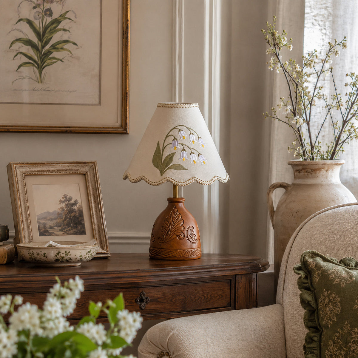 Close-up of the vintage-style cream fabric shade with scalloped edge.