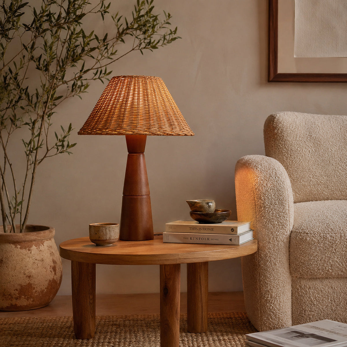 Zaya Table Lamp against a neutral wall, highlighting its organic modern design.