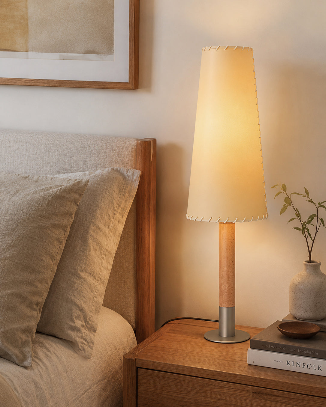 Lifestyle image of the Kove Parchment Floor Lamp next to a sofa.