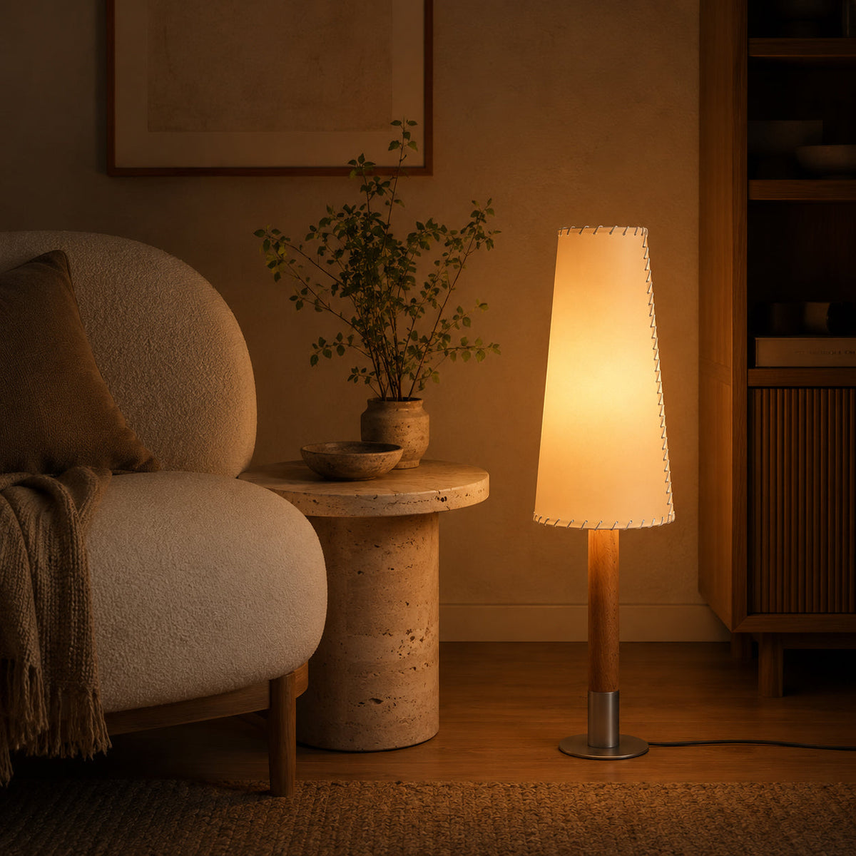 Close-up of the push-button switch on the lamp's cord.
