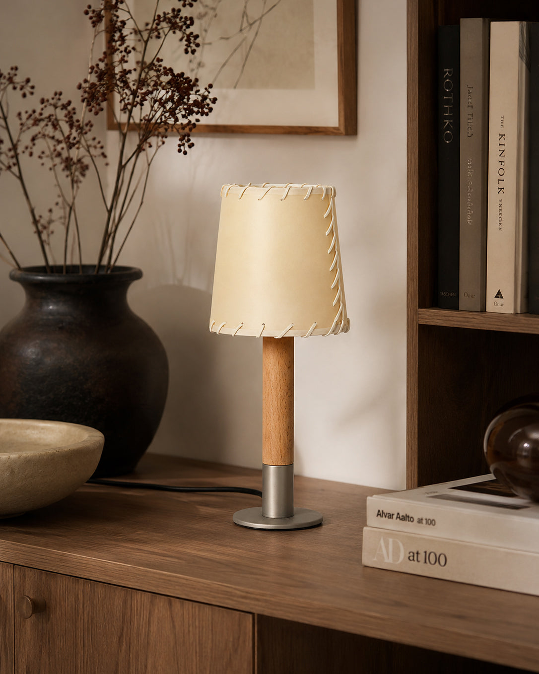 Angled view highlighting the texture of the parchment shade.