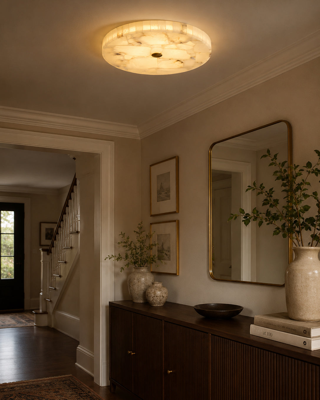 Detail shot of the gold brass finish on the ceiling light.