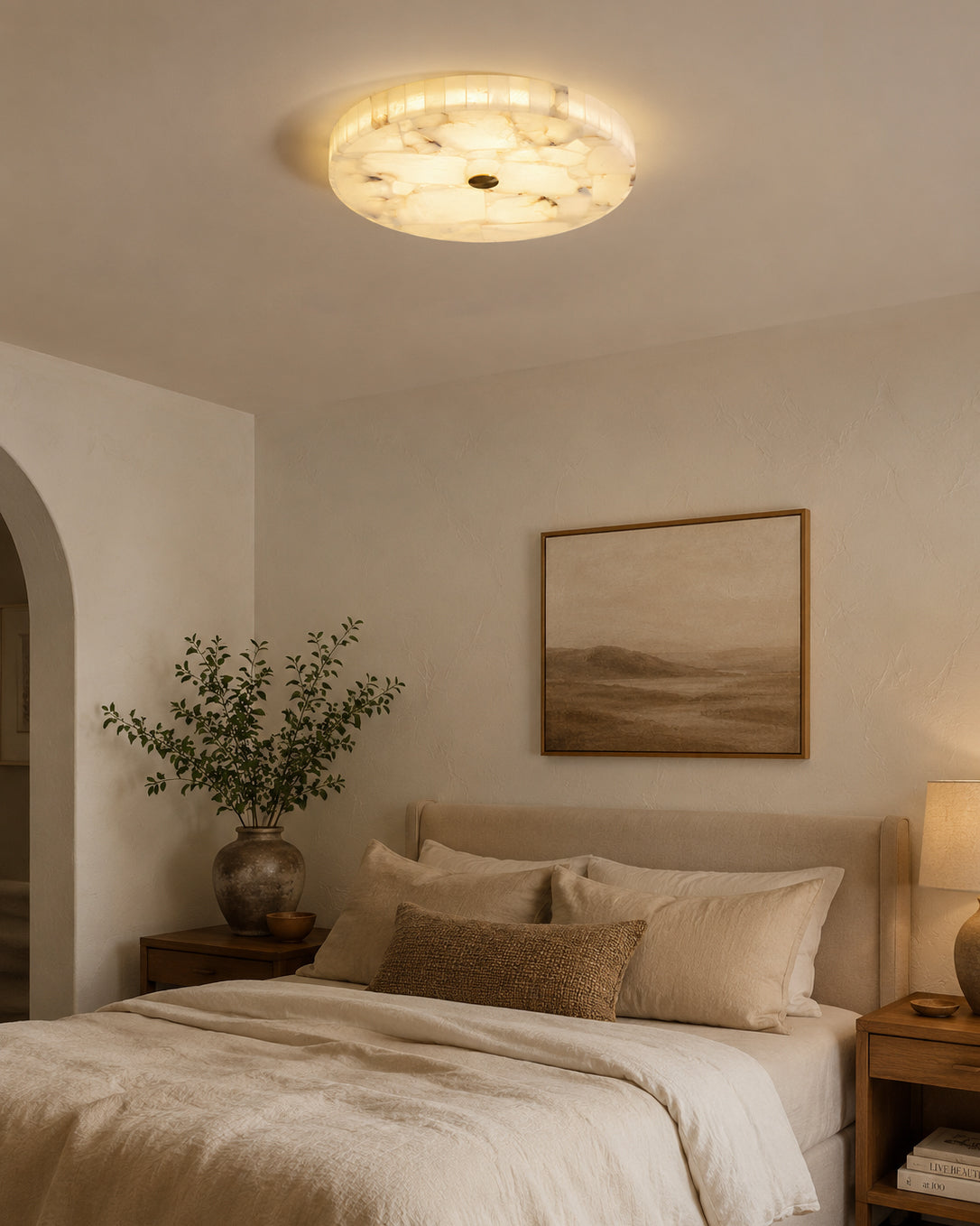 Top-down view of the round alabaster ceiling light.
