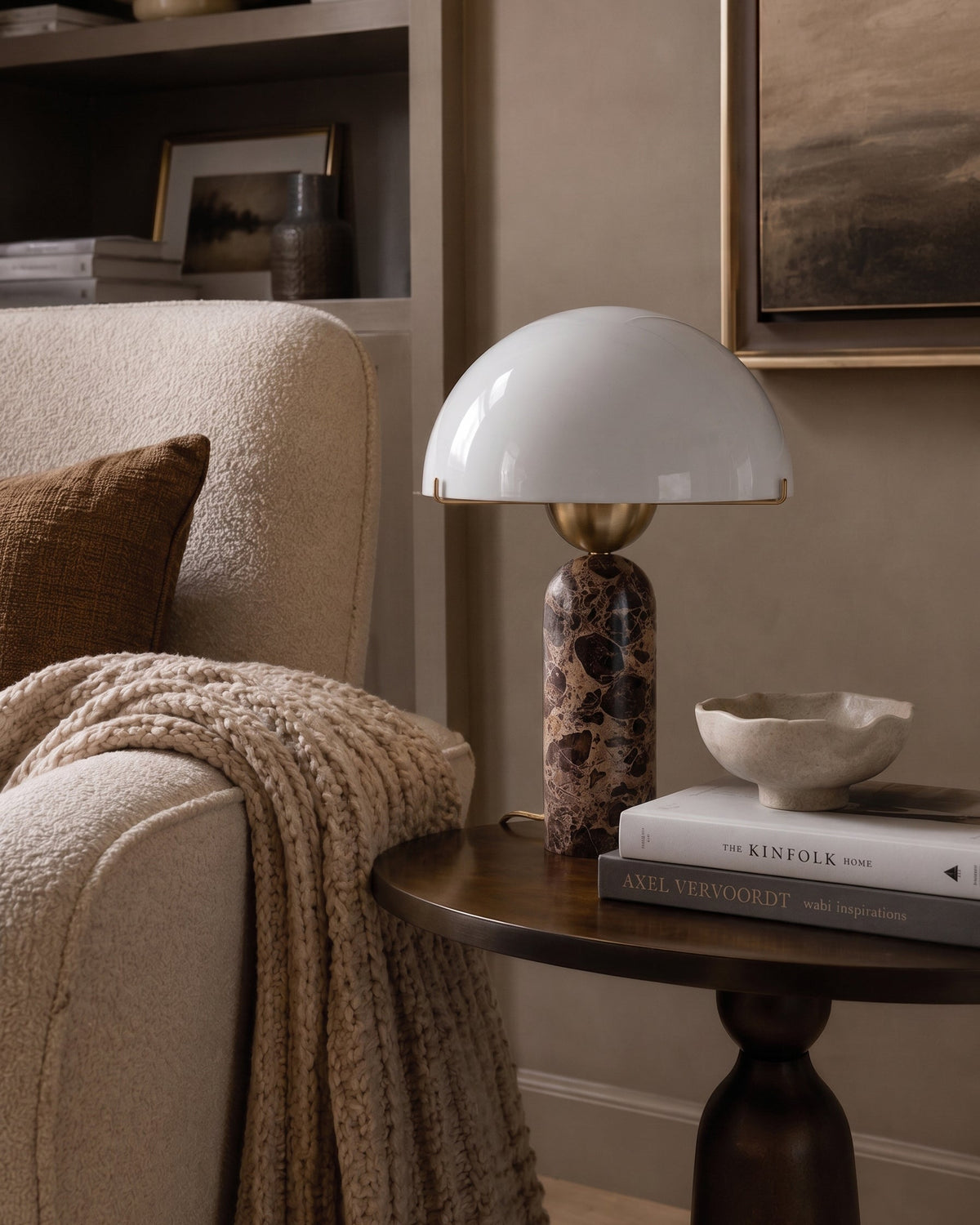 Top-down view of the Milano lamp, showing the circular marble and glass forms.
