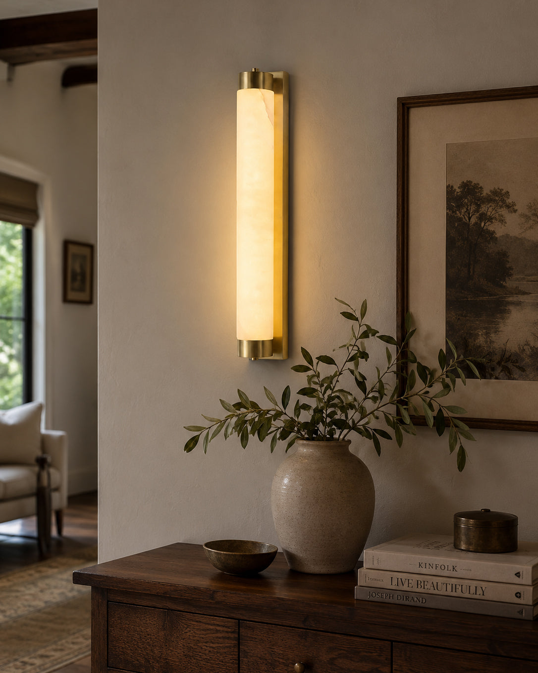 The Langham Alabaster Wall Sconce in a clean white finish.