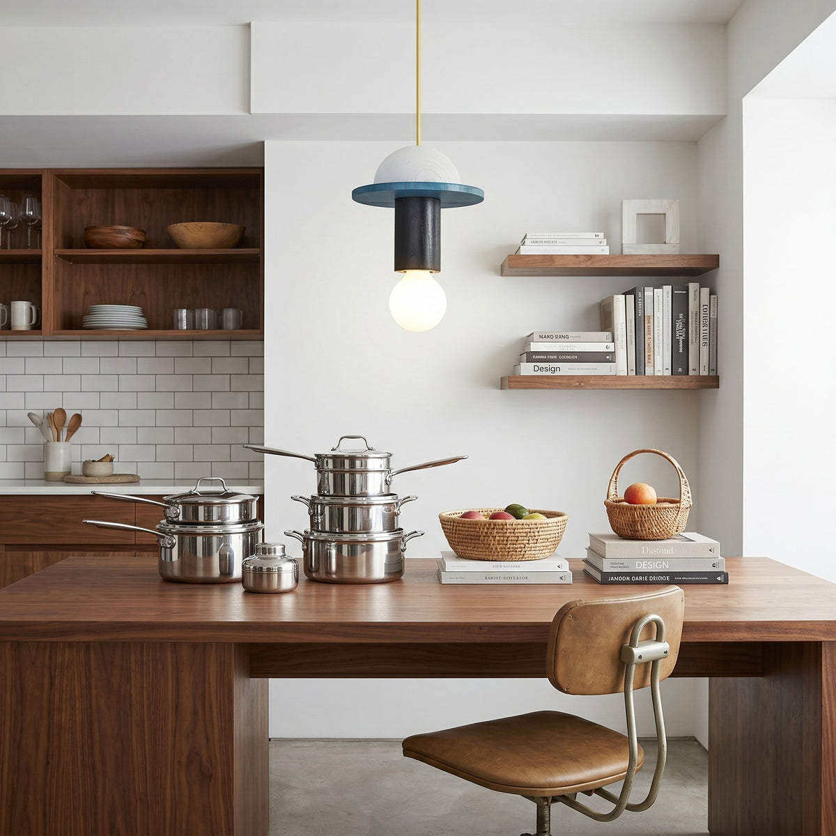 A cluster of Klee Geometric Pendant Lights in various colors hanging over a table.