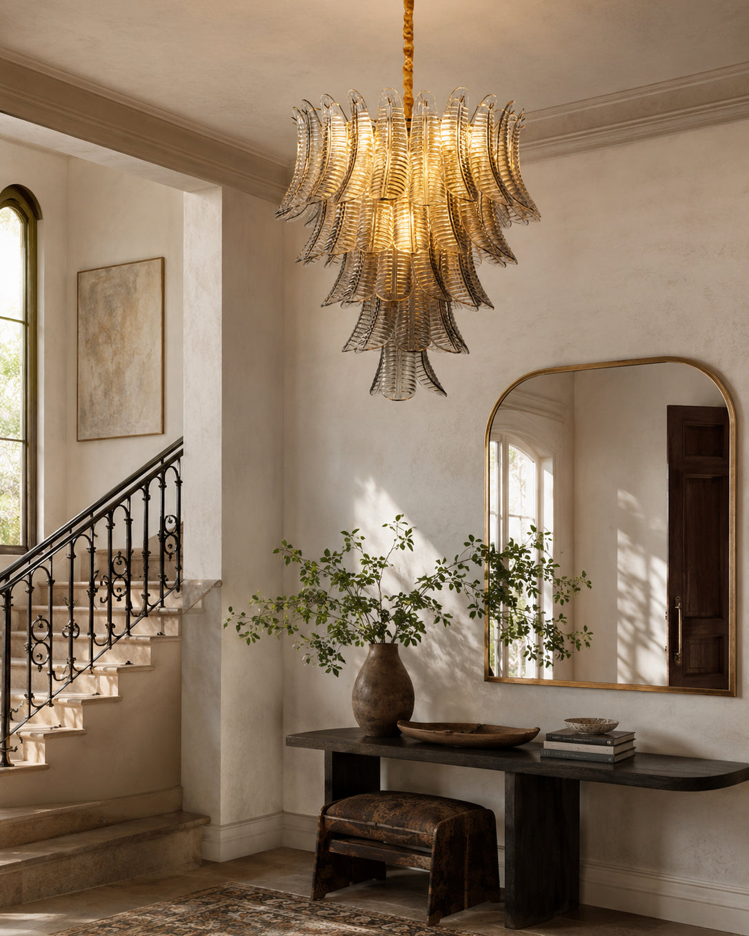 The Isolde Chandelier in a clear glass finish, creating a bright and airy look.
