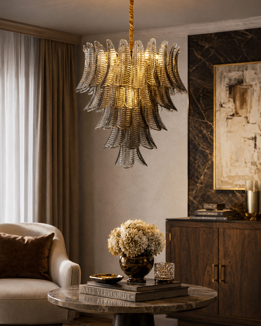 The Isolde Glass Chandelier hanging in a high-ceilinged entryway.