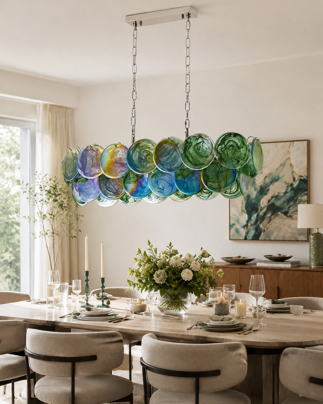Close-up view of the overlapping hand-struck glass discs on the Pavone chandelier.