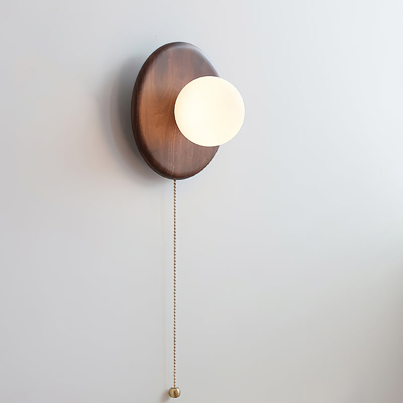 Side profile of the Abel wall sconce mounted on a wall.