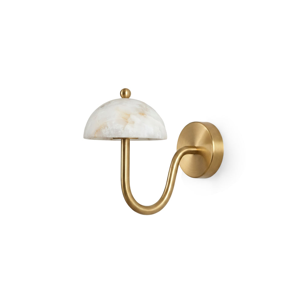 Ripple Alabaster Wall Sconce with brass arm against a neutral wall.