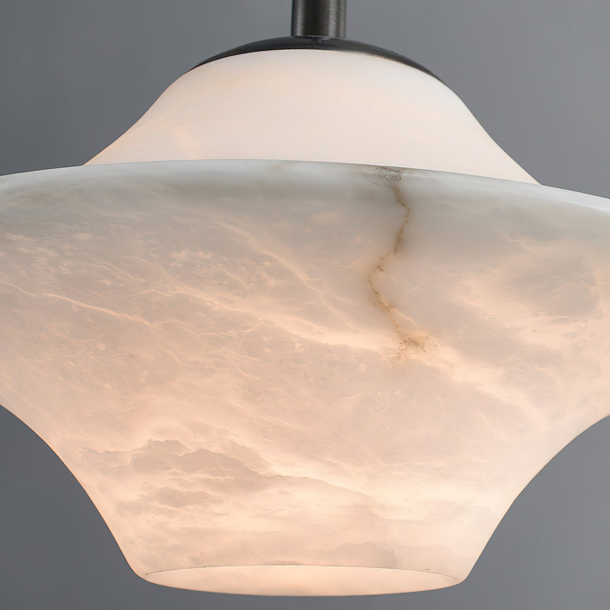 Lifestyle image of the pendant light in a cozy breakfast nook.
